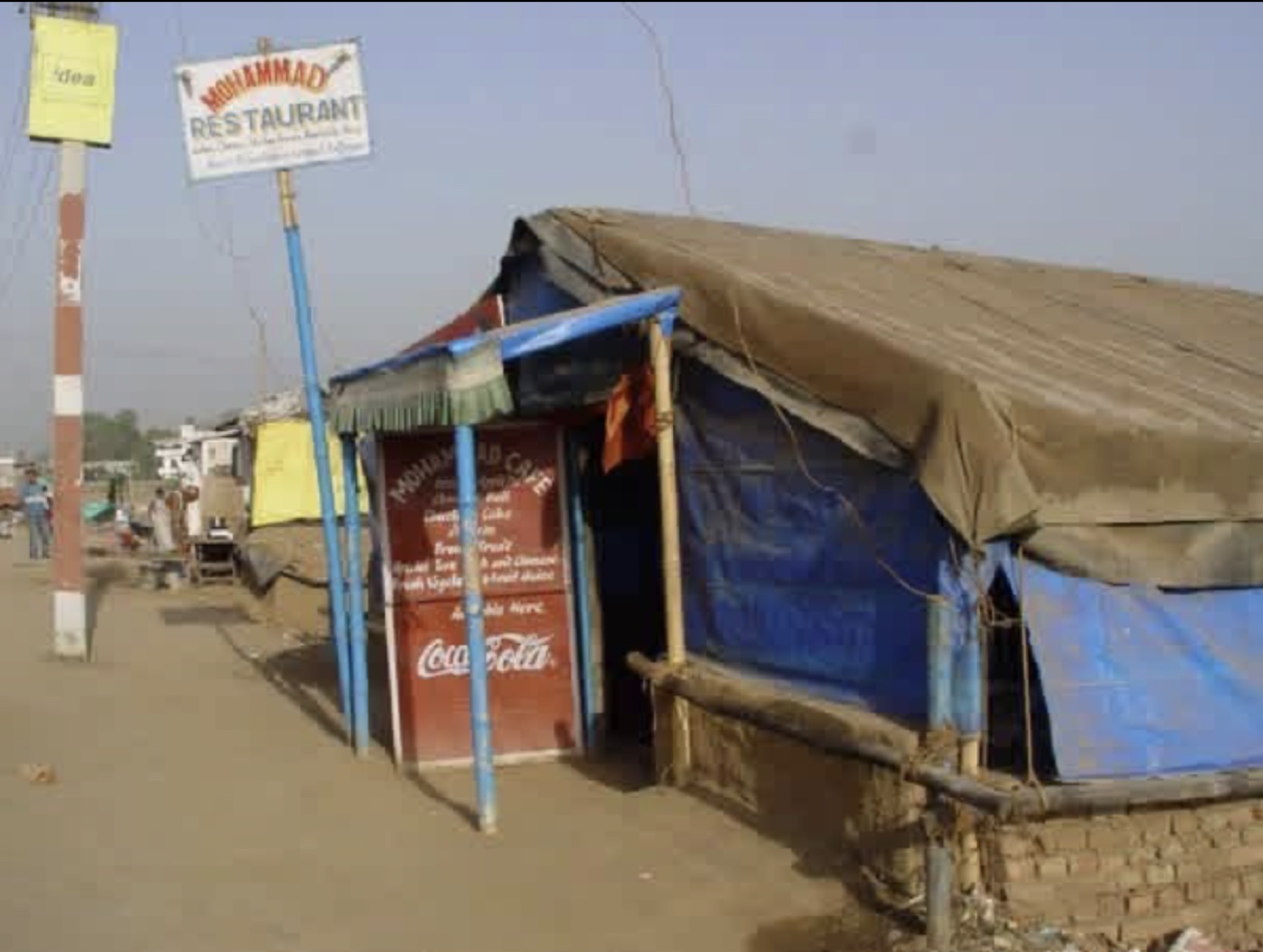 Mohammad’s first café tent beside Kalachakra Ground — where the restaurant’s story began.